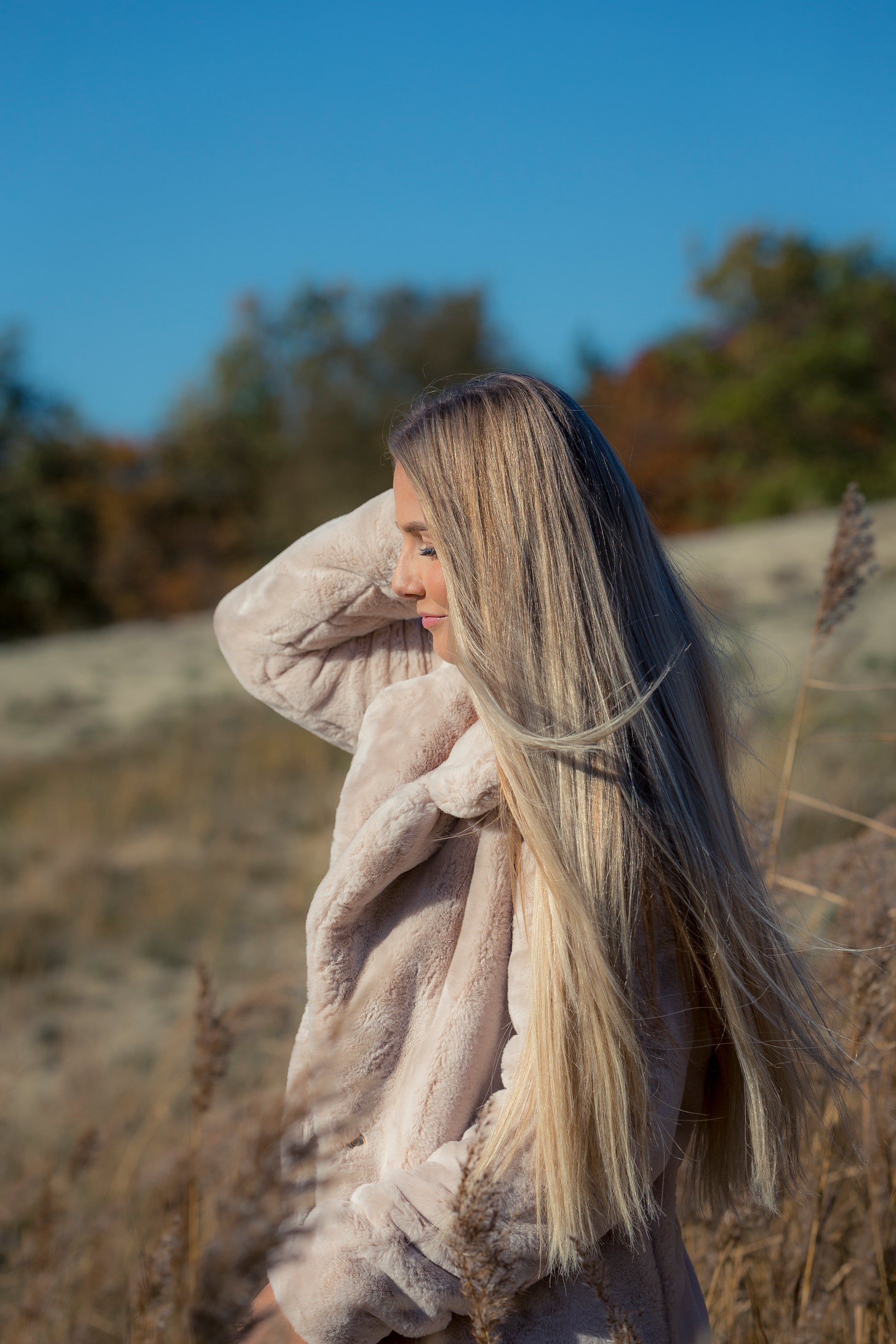 Model met halo extensions van 250 gram en de lengte 66 cm