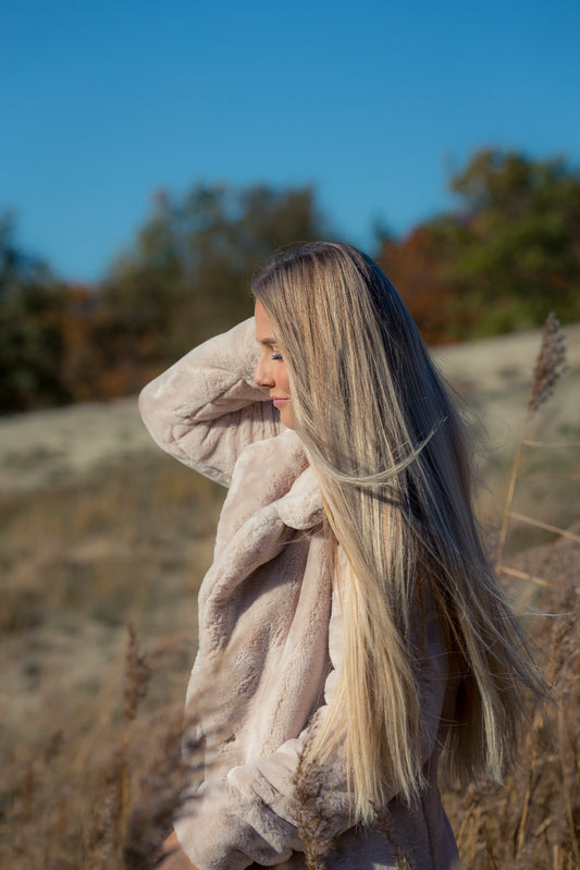 Model met halo extensions van 250 gram en de lengte 66 cm