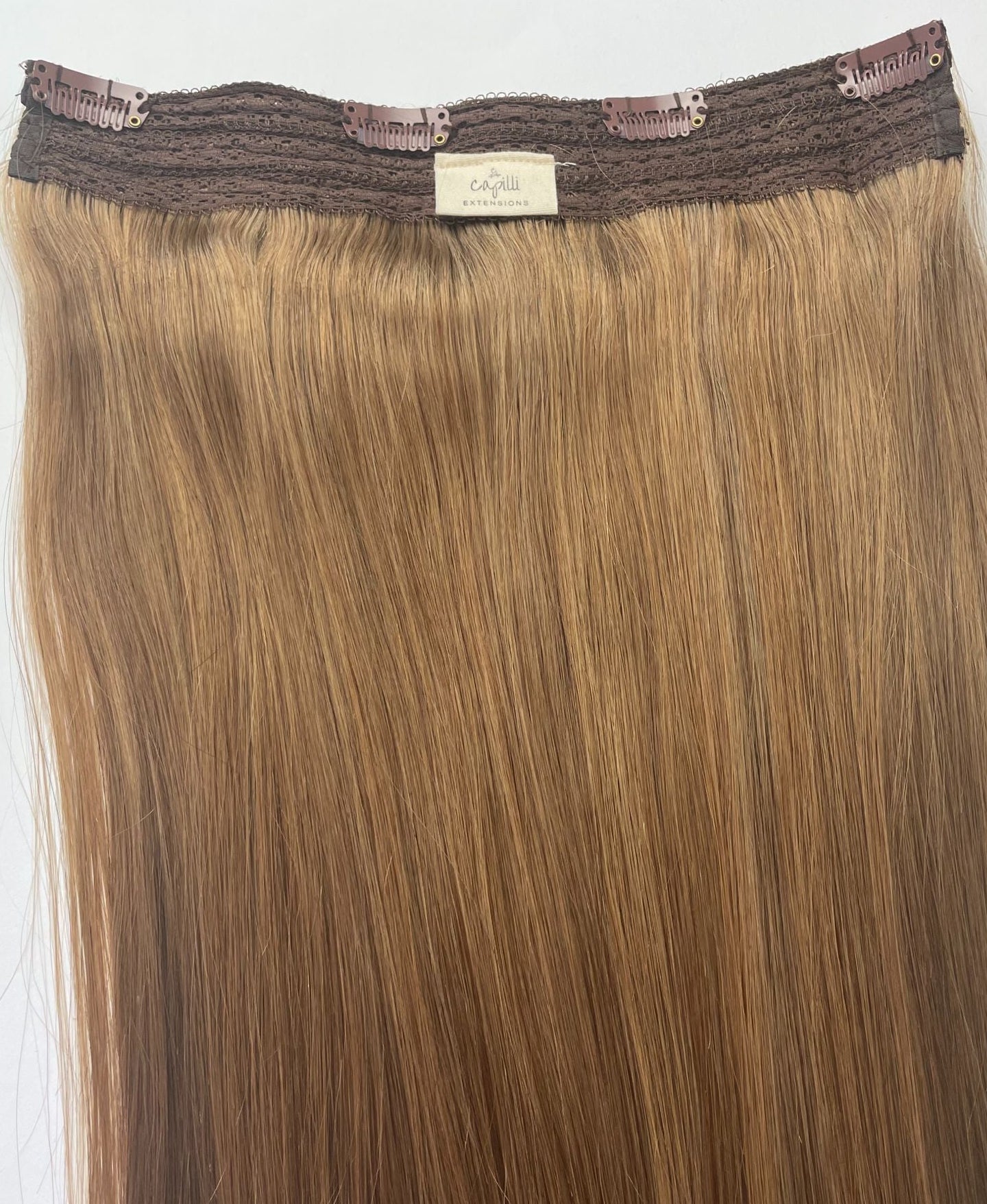 Capilli Extensions halo extensions, 100g tot 300g, met natuurlijke haarverlenging en volume, zichtbaar in de afbeelding.