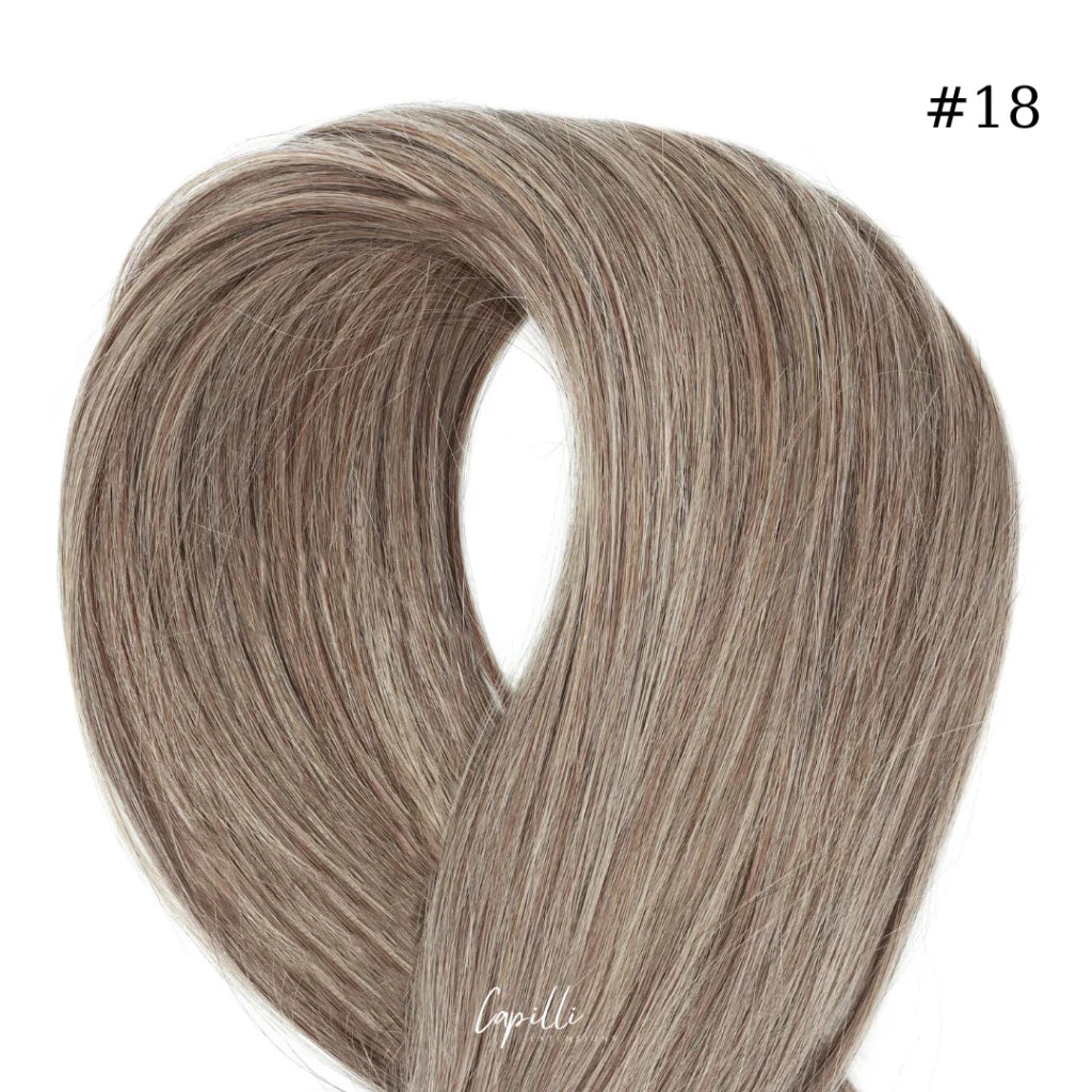 Ponytail extensions van premium 100% Remy haar, kleur #18, keuze uit 100g t/m 250g en lengtes 30 cm t/m 76 cm.