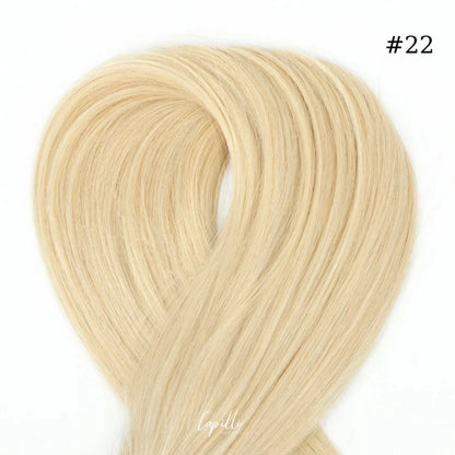 Ponytail extensions in blonde color #22, made from premium 100% human remy hair, available in 100g to 250g, length 30cm to 76cm.