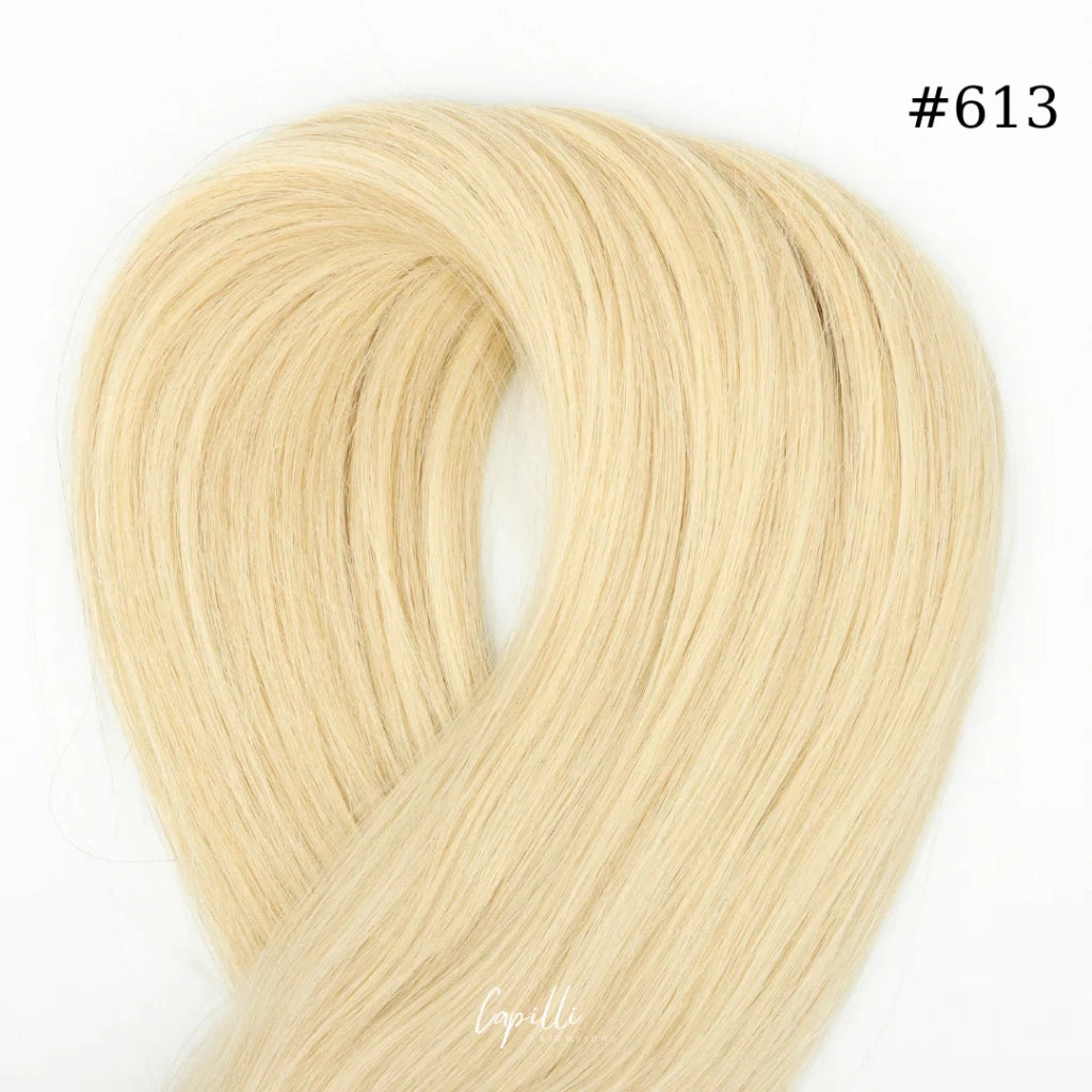 Ponytail extensions #613 in blonde shade, 100% human remy hair, available from 100g to 250g and 30cm to 76cm.