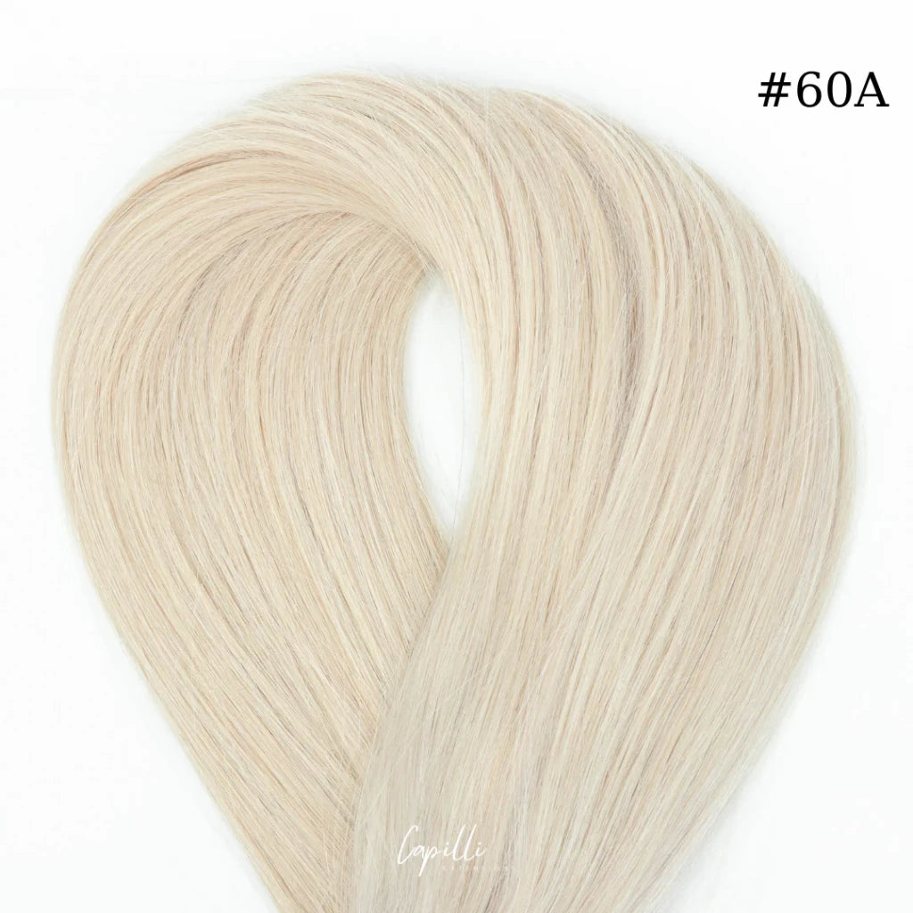 Ponytail extensions in #60A platinum blonde, 100% human Remy hair, 100-250g, lengths 30-76 cm, single or double drawn option.